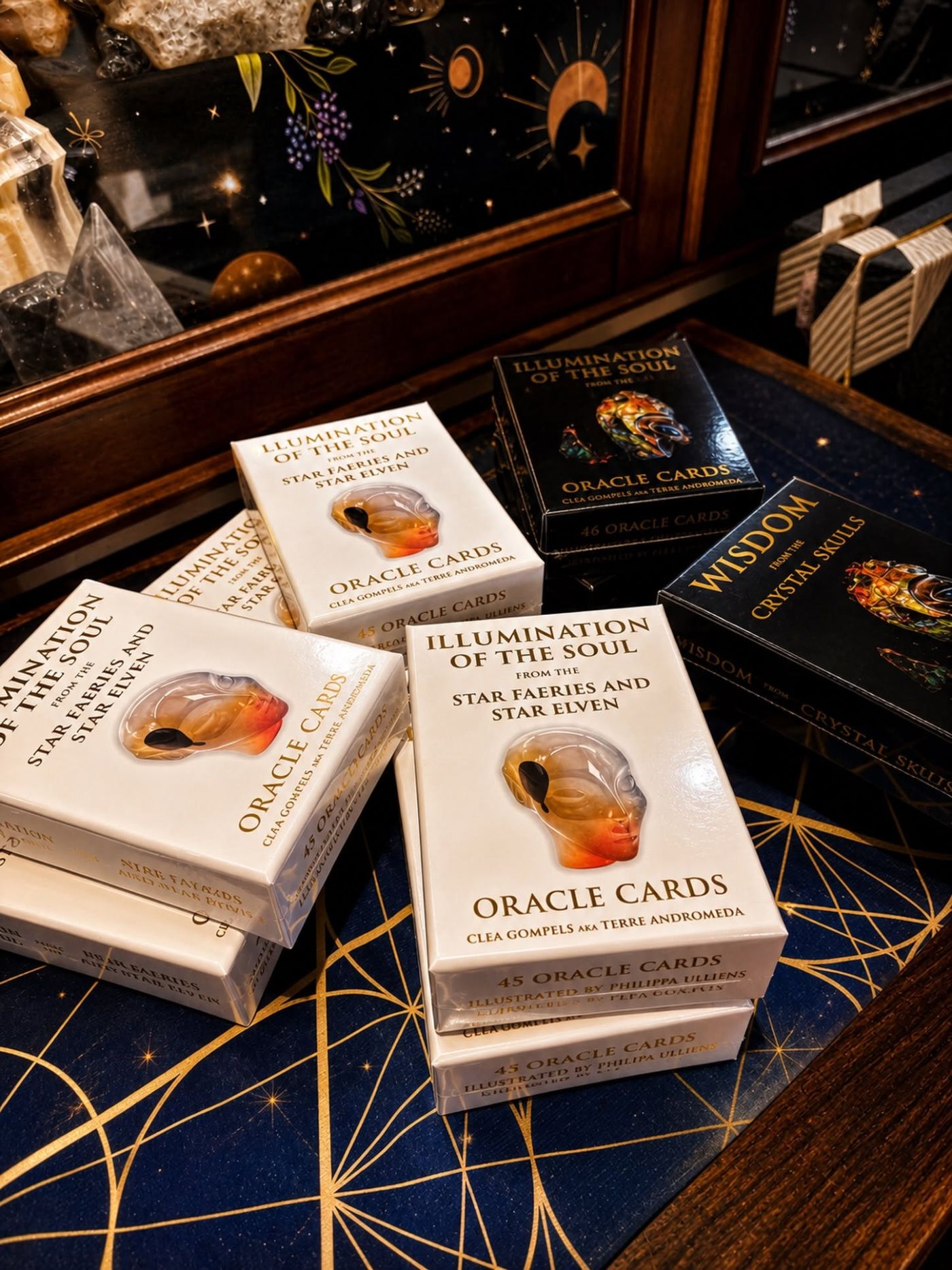 Both decks stacked on the starfield cloth in the Henge Shop window